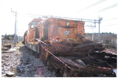 D 145.1034 e carrello dell'ultimo carro del treno merci.